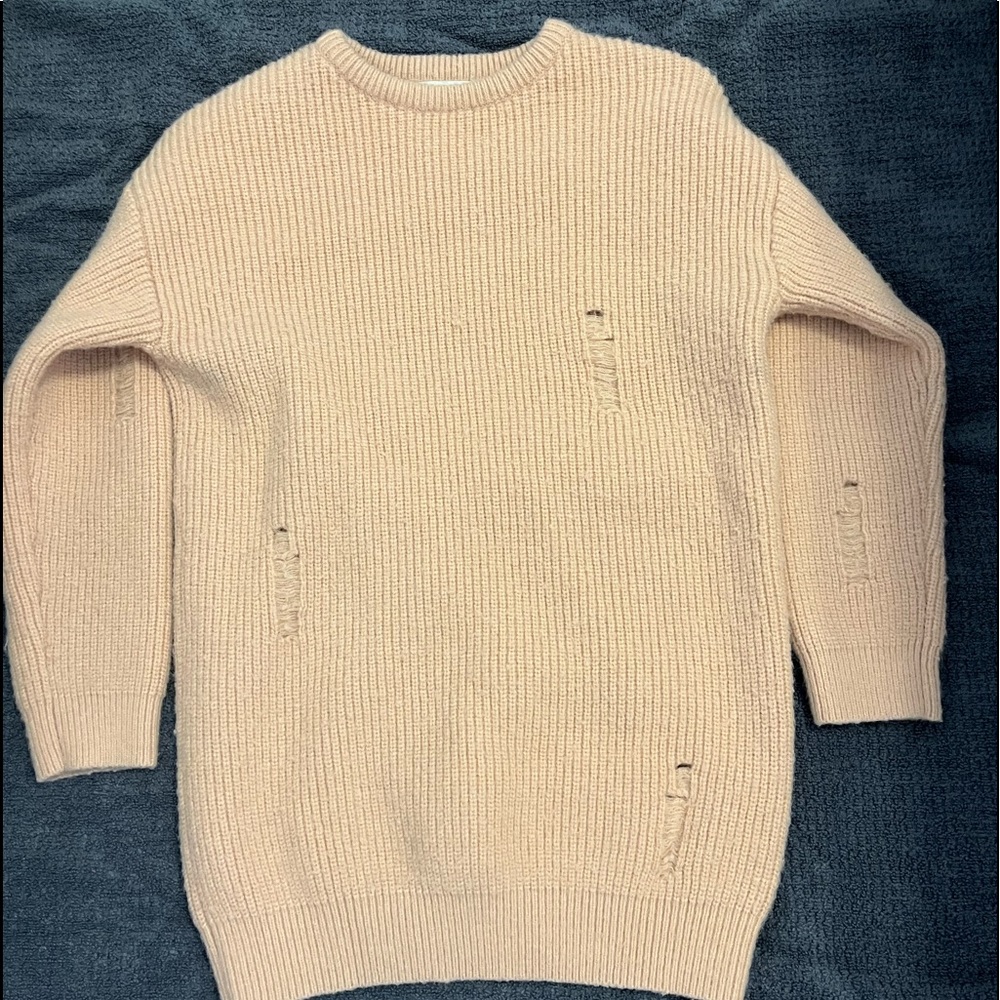 very light peachy pink sweater MADE with the rips